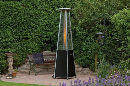 Lifestyle tahiti ii flame patio heater in black and silver with a visible heating element in a glass enclosure