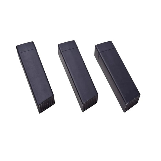 Three sleek black aluminum usb flash drives with matte finish and textured edges for moddern kamado pedestal legs