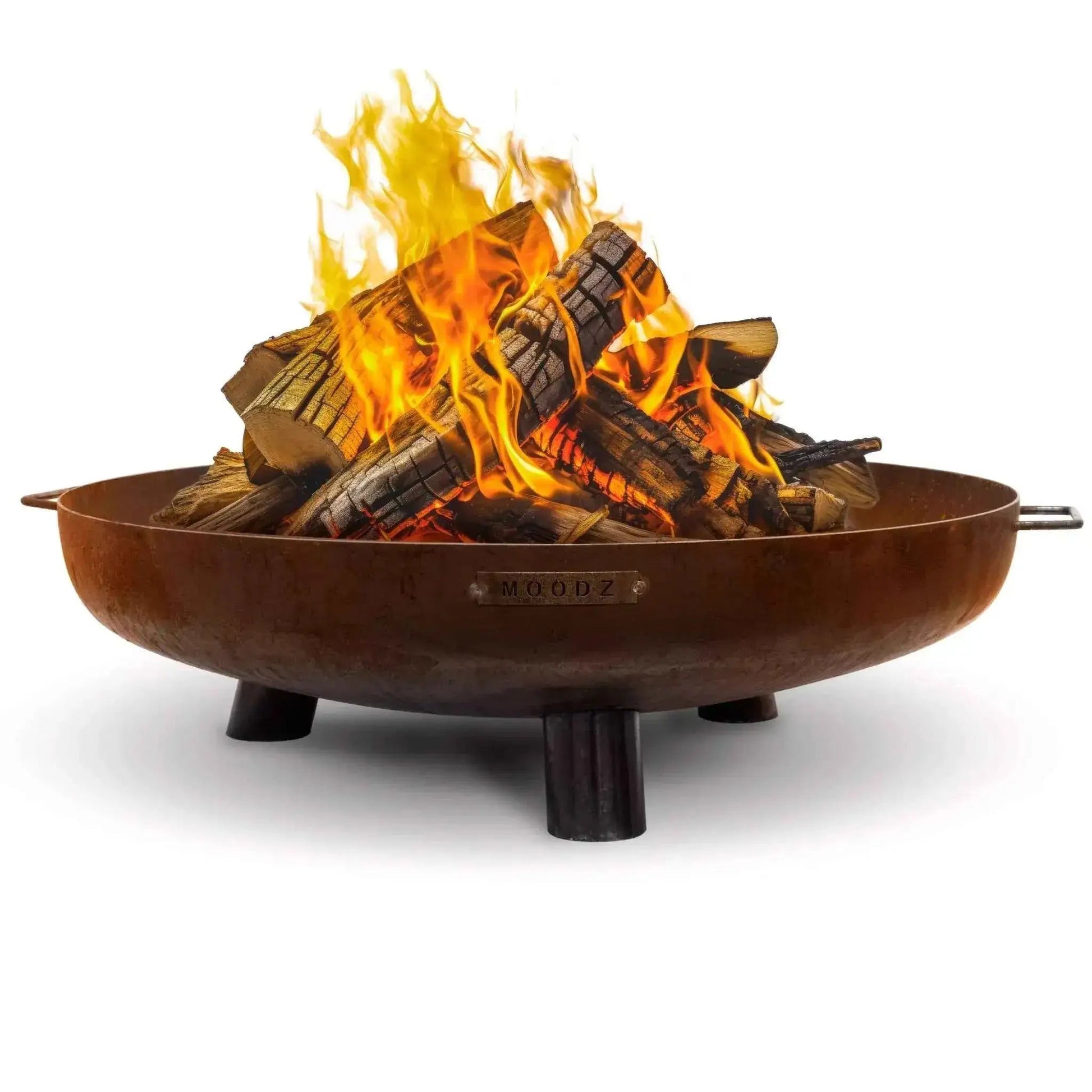 Rustic brown corten metal fire pit with three sturdy legs and burning wood in moodz feet and handle fire bowl