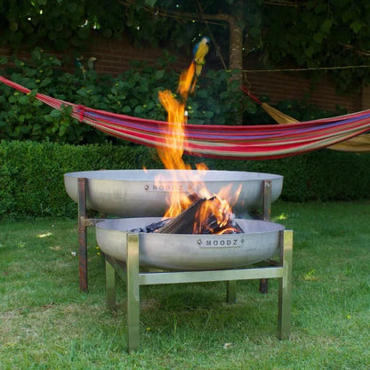 Stainless steel double-tiered fire pit with modern minimalist design and moodz logo engraved on each bowl