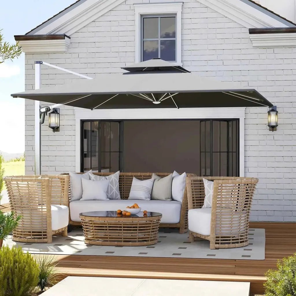 Black retractable awning with white metal frame mounted on white brick house for outdoor shade and solar LED lighting