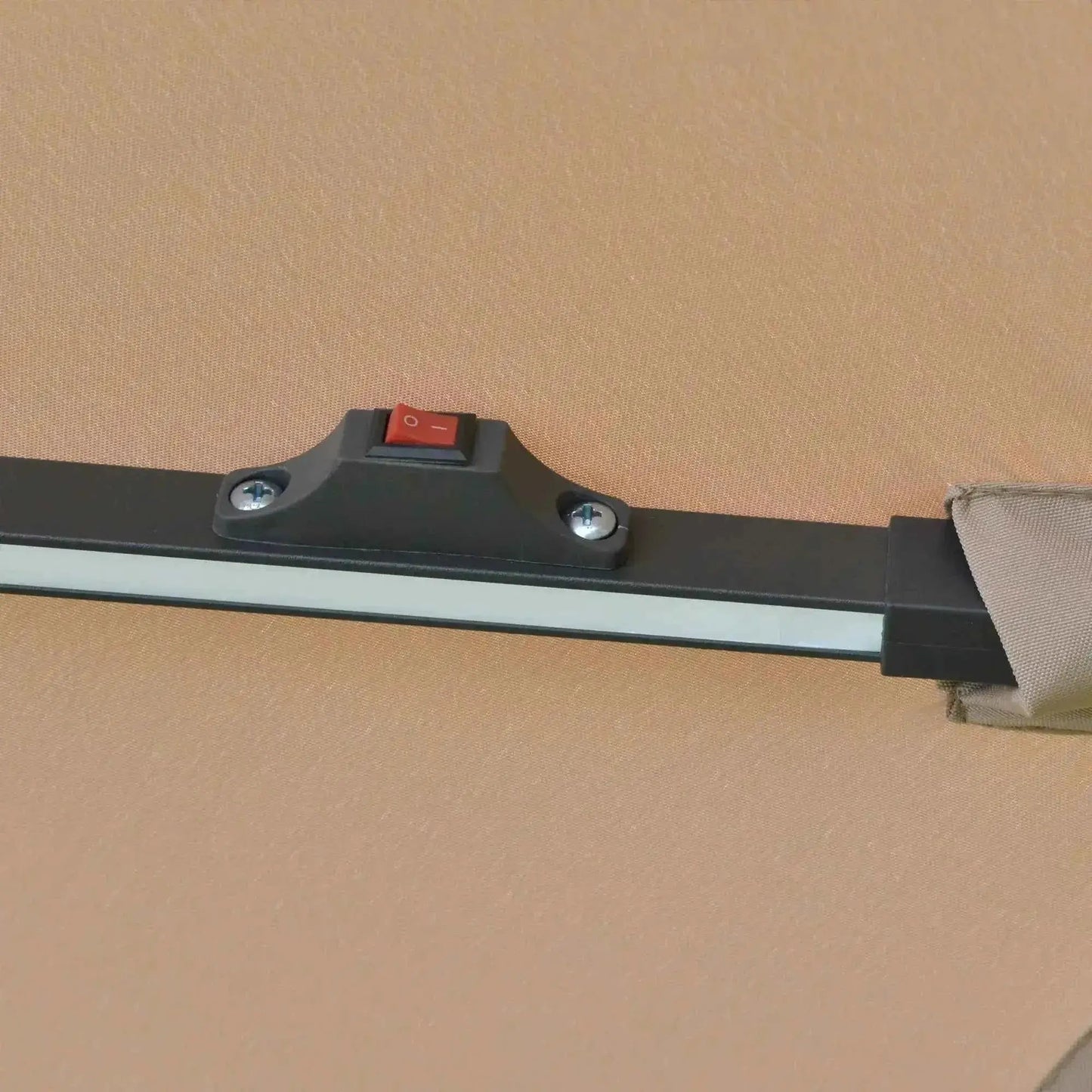 Black plastic switch with red button on sleek modern frame of outsunny 3m solar led cantilever parasol brown base