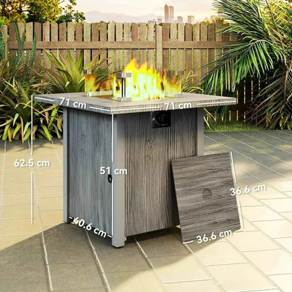 Outsunny 50,000 btu dark grey gas fire pit table with gray wood-grain square top and glass-enclosed flame for outdoor use