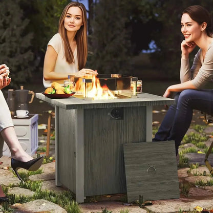 Gray wood-grain outdoor fire pit table with glass top and built-in flame feature by Outsunny in dark grey