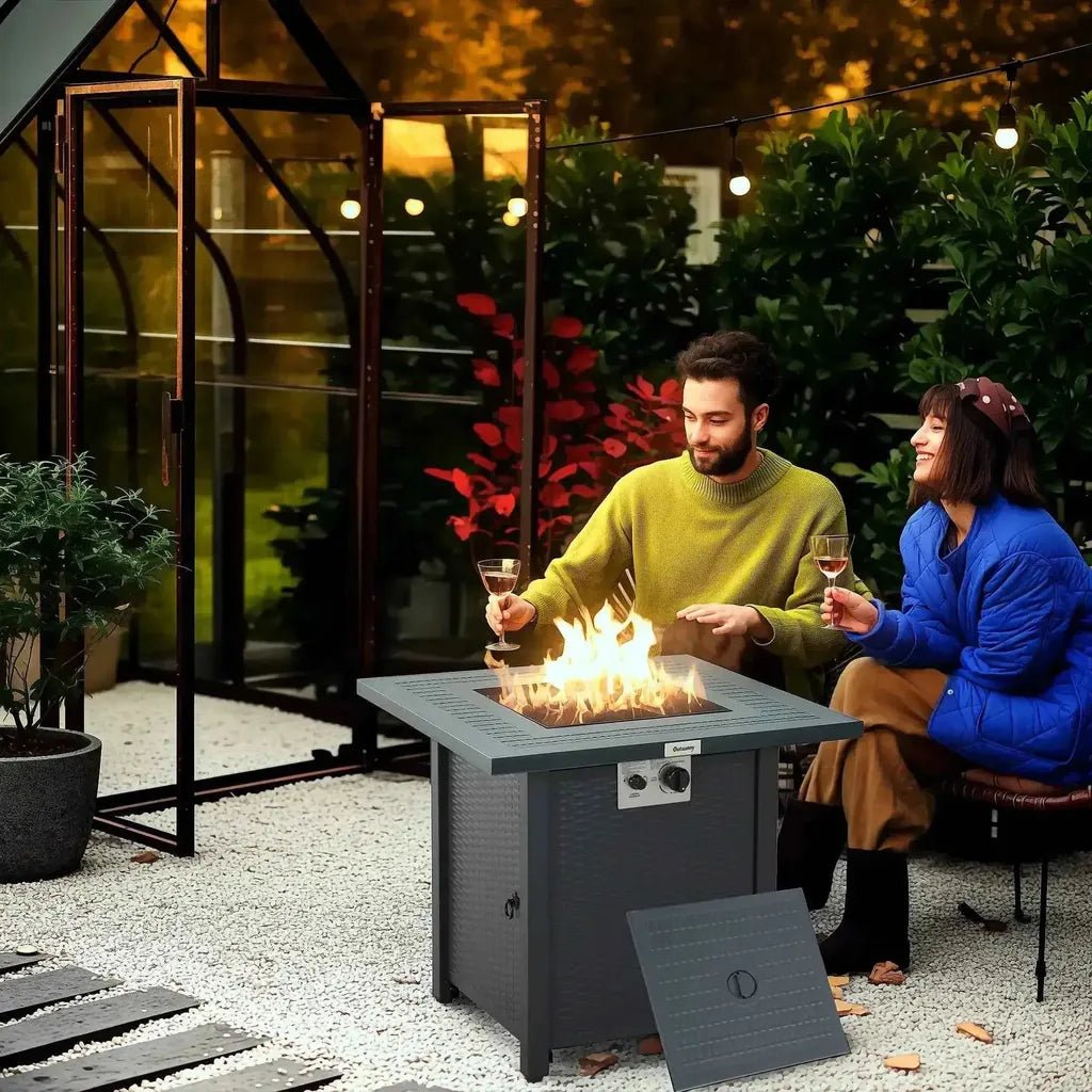 Gray square outdoor gas fire pit table with 40000 BTU flame and front control knobs by Outsunny in black and dark grey