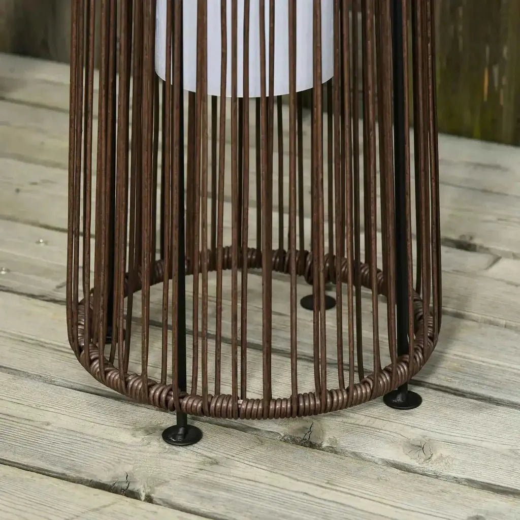 Outsunny brown woven metal garden solar powered lantern with white cylindrical lampshade and auto on off feature