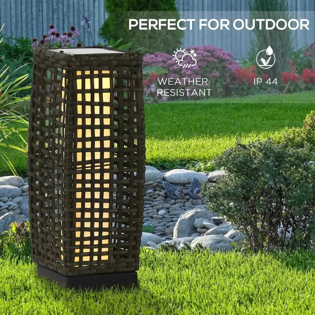 Outsunny outdoor woven dark brown rattan solar lantern with warm yellow glow and auto on off feature