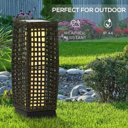Outsunny outdoor woven dark brown rattan solar lantern with warm yellow glow and auto on off feature