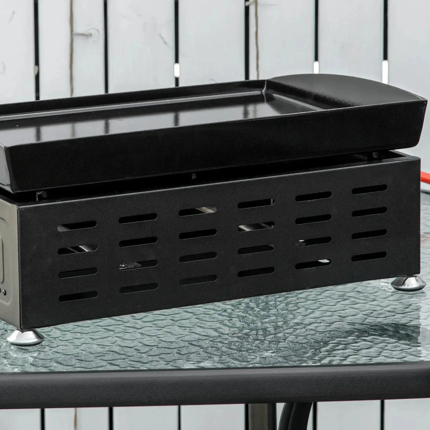 Outsunny portable tabletop gas plancha bbq in black with two stainless burners and a perforated ventilation base