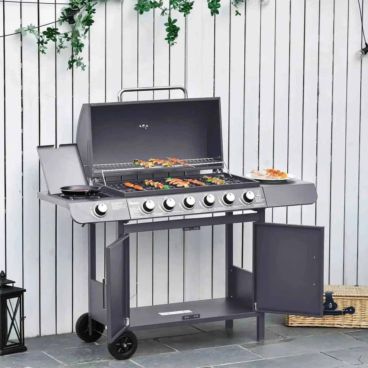 Outsunny seven-burner gas bbq grill in grey stainless steel with six burners and side storage compartments