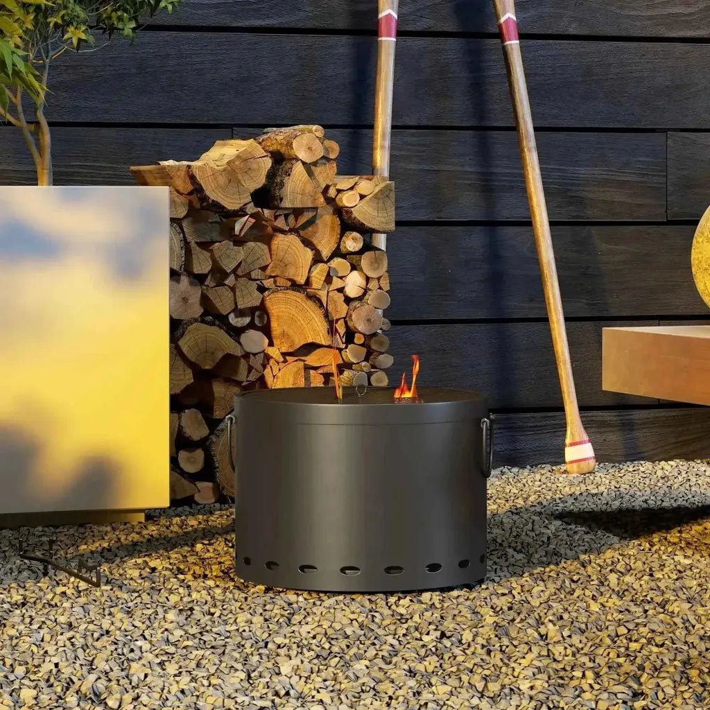 Outsunny smokeless portable fire pit in dark grey with ventilation holes and side handles for easy carrying