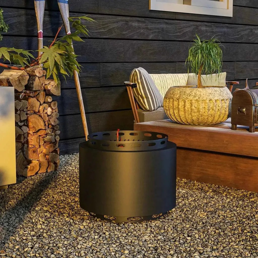 Outsunny smokeless portable black cylindrical metal fire pit with circular cutouts and poker 48.5cm