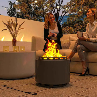 Outsunny smokeless portable dark grey cylindrical outdoor fire pit with glowing flames and circular metal grate