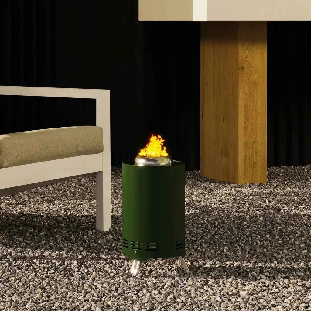 Outsunny smokeless stainless steel green cylindrical outdoor fire pit with silver top ventilation slits and legs