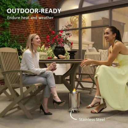 Outsunny smokeless stainless steel outdoor fire pit tabletop in silver tone with sleek cylindrical design and small flame visible