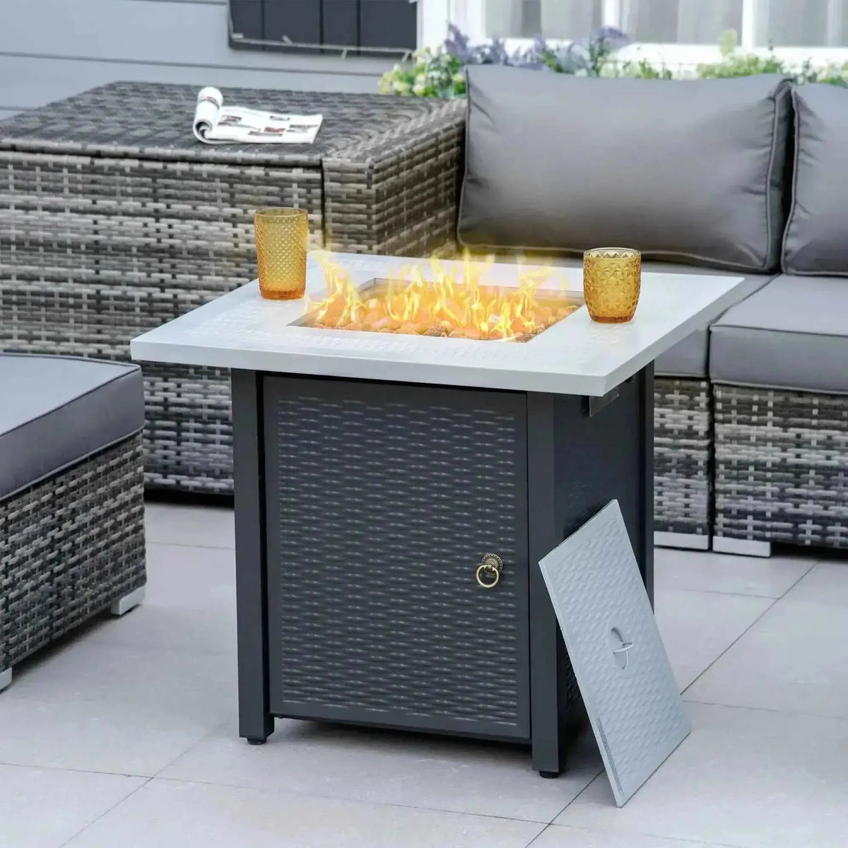 Outsunny square propane gas fire pit table with gray wicker base white top and burning flames 40000 btu black grey
