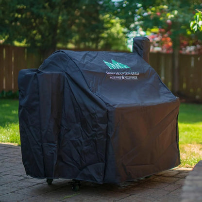 Black protective cover for green mountain grills wood-fired pellet grill designed for outdoor use