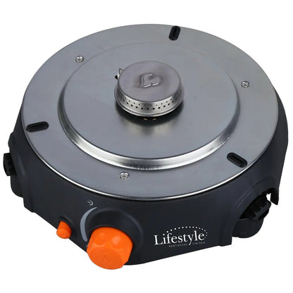 Black and silver Sahara Multi Grill portable outdoor gas stove with orange control knobs for camping and grilling