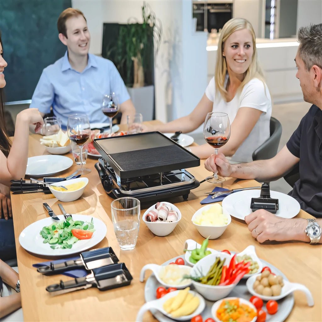 Black electric Steba RC28 premium cast raclette grill with flat ribbed cooking surface and built-in heating elements
