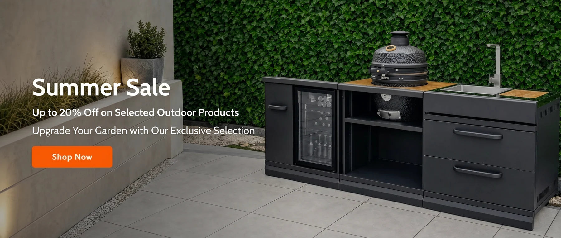 Black outdoor kitchen unit with a built-in refrigerator, sink, and countertop space.