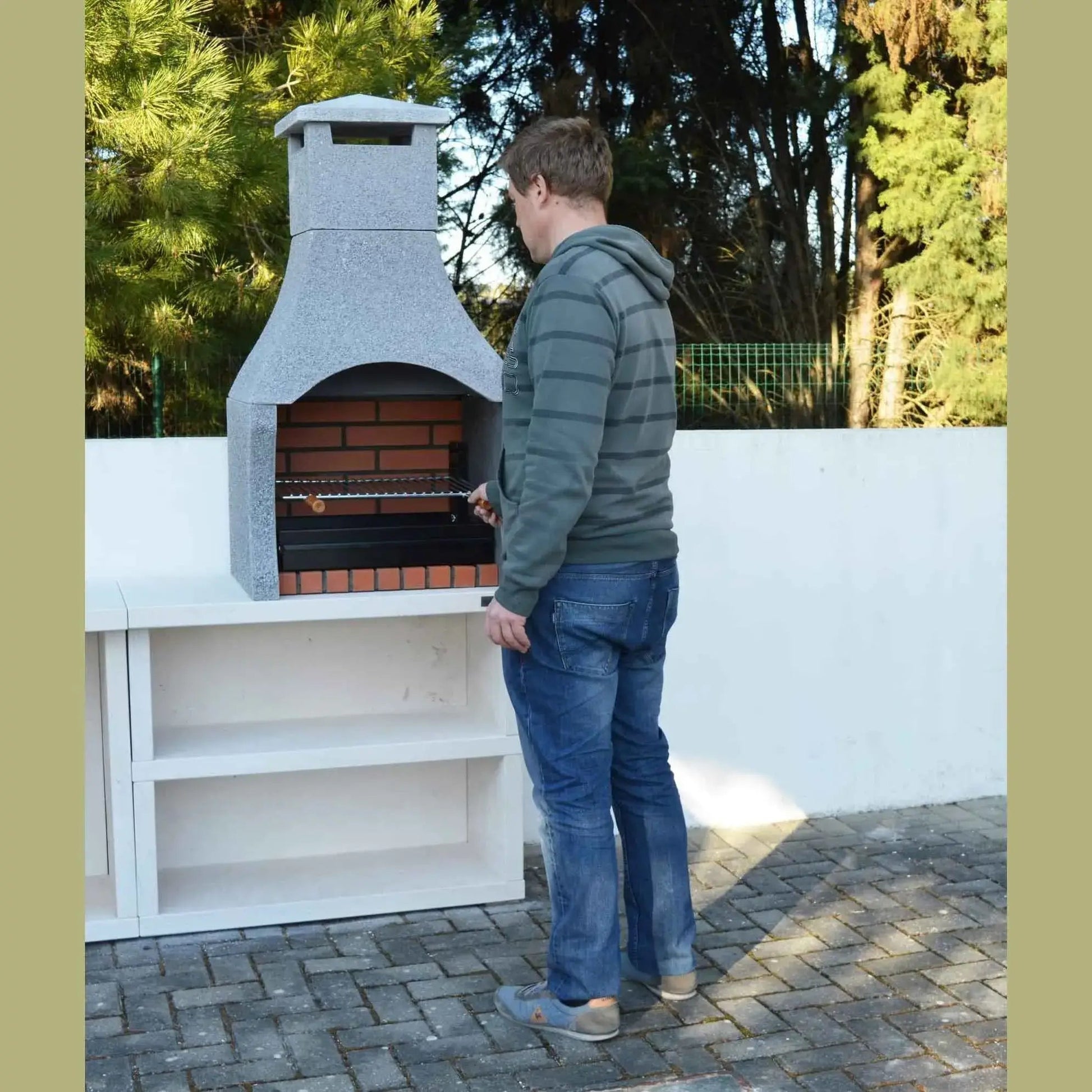 Gray stone outdoor barbecue with brick interior chimney and side table xclusivedecor firenze bbq 201701