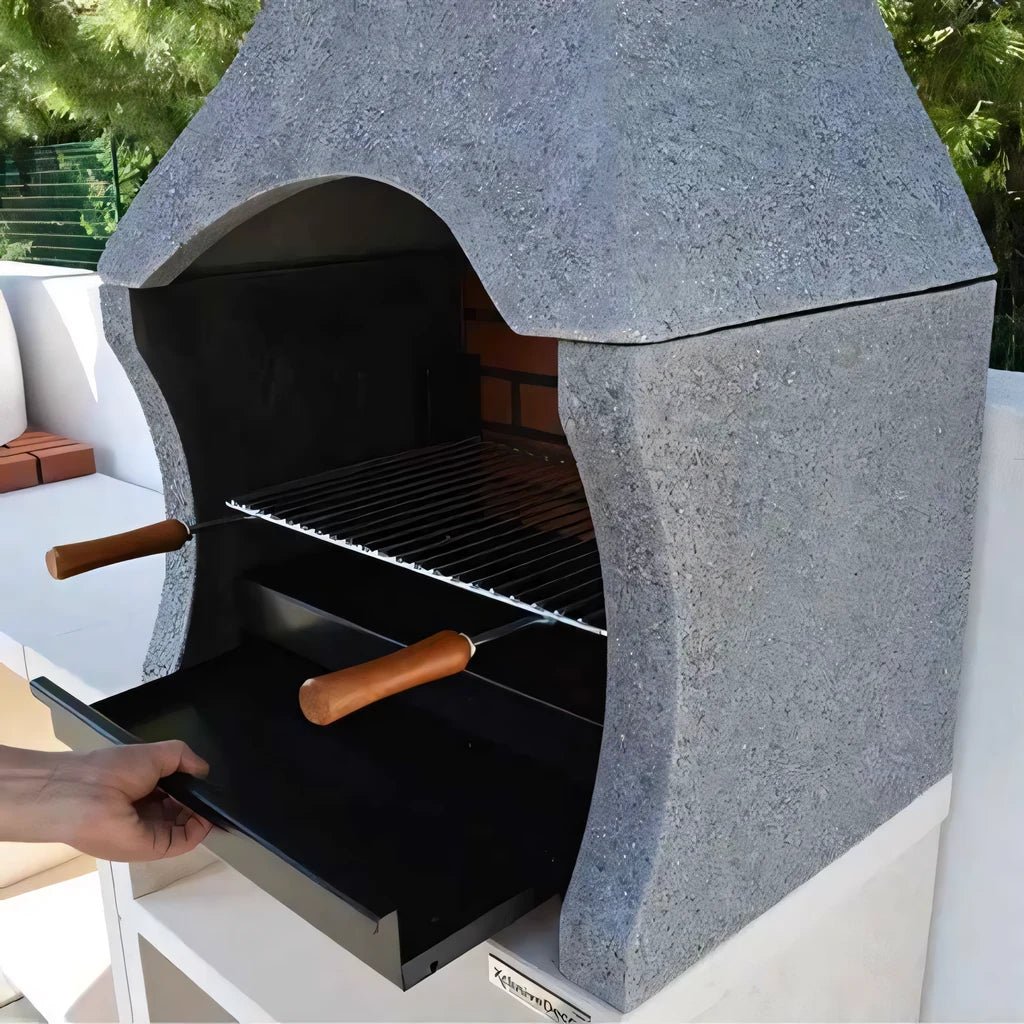 XclusiveDecor Napoli outdoor kitchen gray stone barbecue with black interior and wooden-handled grilling tools