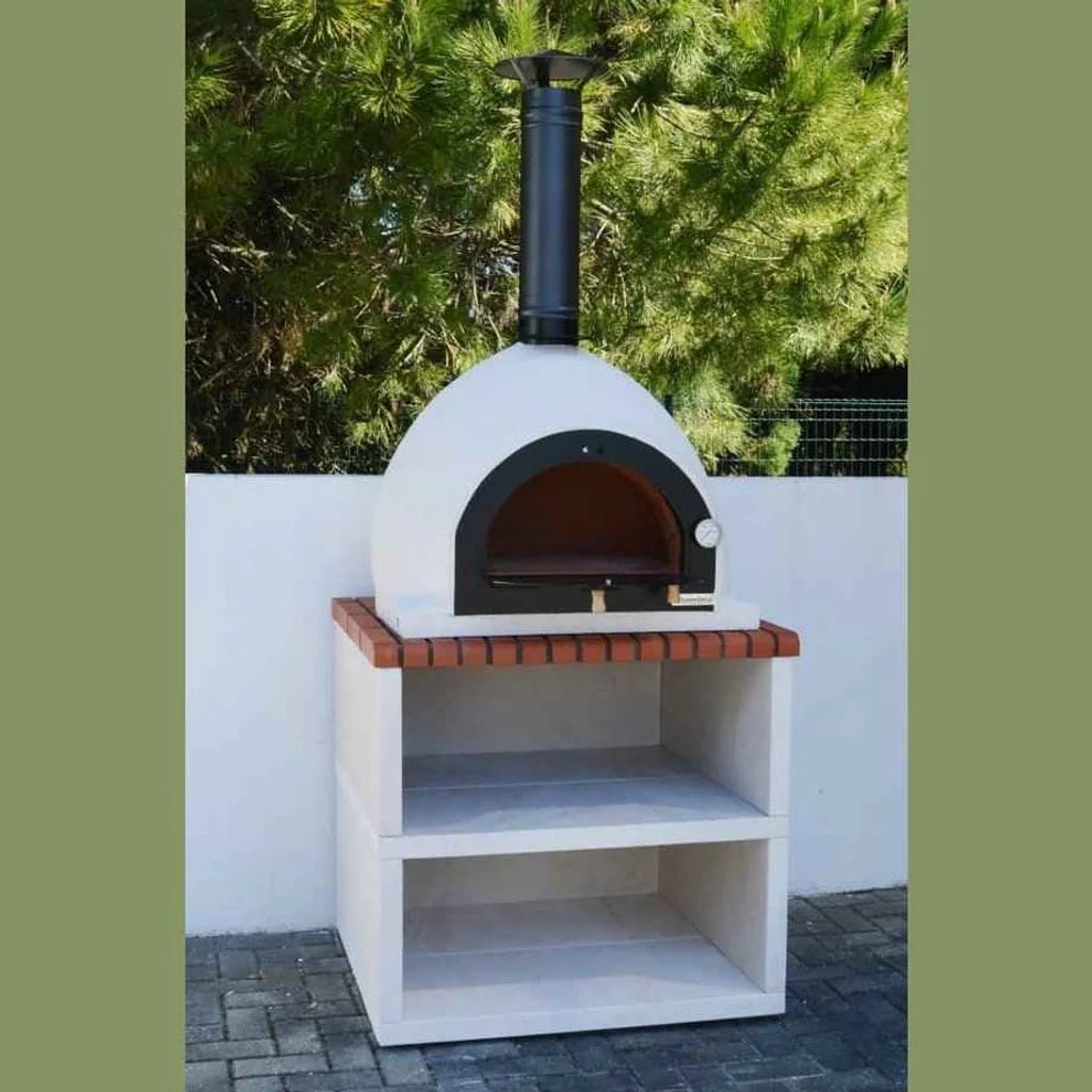 White xclusivedecor royal wood fired pizza oven with black chimney on red brick countertop complete set